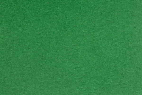 Текстурированная мягкая зеленая бумага для фона. — стоковое фото