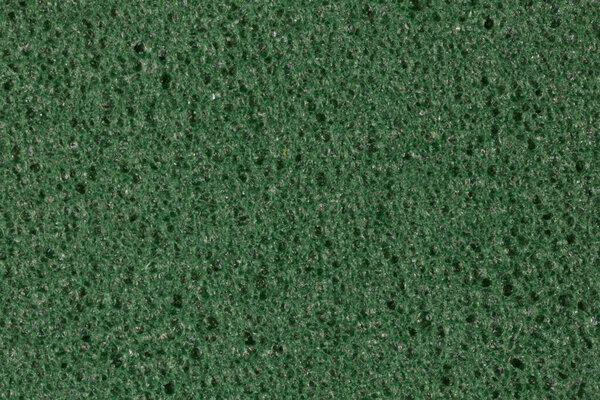 Затемненная зеленая пена EVA текстура с пористостью на поверхности.