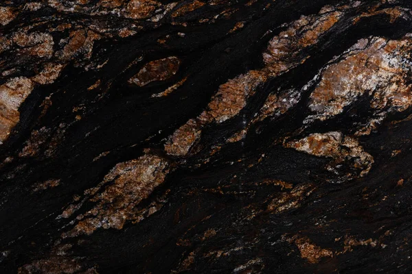 Doğal Kara Magma granit yapısı, koyu renkli katı arkaplan..