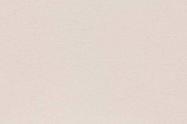 El yapımı kağıdın yumuşak bej arka planı. Yüksek çözünürlüklü fotoğraf.