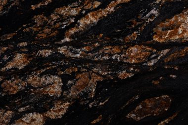 Yeni Siyah Magma granit dokusu, çekici koyu renkli doğal arkaplan..