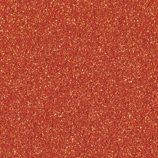 Orange glitter sparkle. Background for your design. Low contrast photo. Seamless square texture. Tile ready.