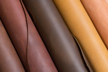 Close up of some beige leather rolls. High resolution photo. clipart