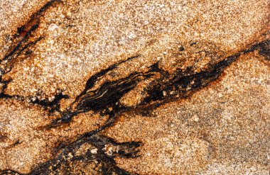 Yeni Sedna - granit arkaplan, bireysel iç projeniz için ideal altın tonda levha dokusu fotoğrafı.