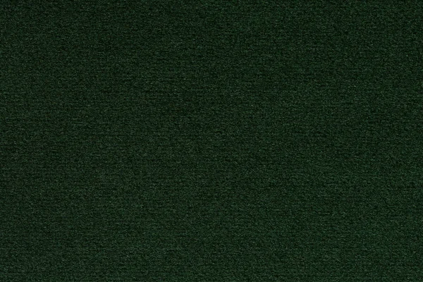 New material texture in dark green colour. High resolution photo.