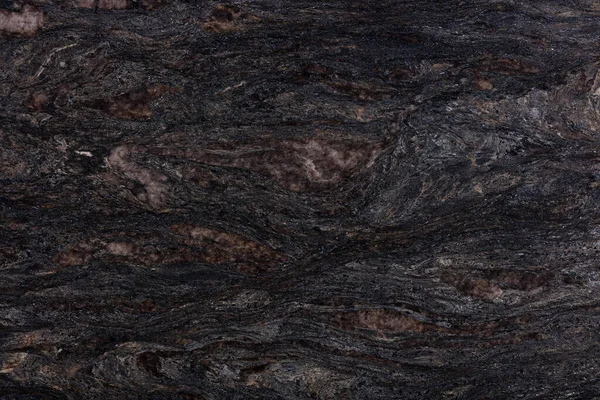 Natural granite texture in stylish black colour, background for new interior.