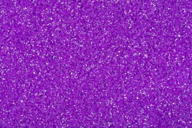 Perfect glitter background in your adorable violet tone, Christmas texture for your mood. High resolution photo.