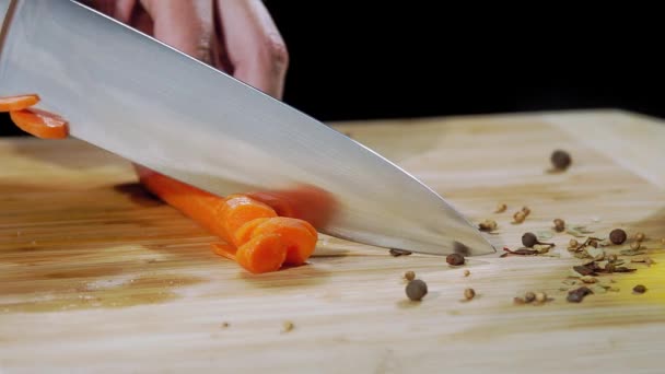 Chef Cuts Carrot Slow Motion Slice Carrot Close Man Cuts — Stock Video
