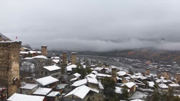 Aerial winter scenery of Svan towers covered with snow — Stock Video