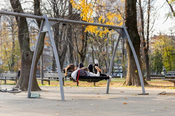 Belgrade Serbia November 2021 Girls Children Laying Swing Playground Park — Stock Photo, Image
