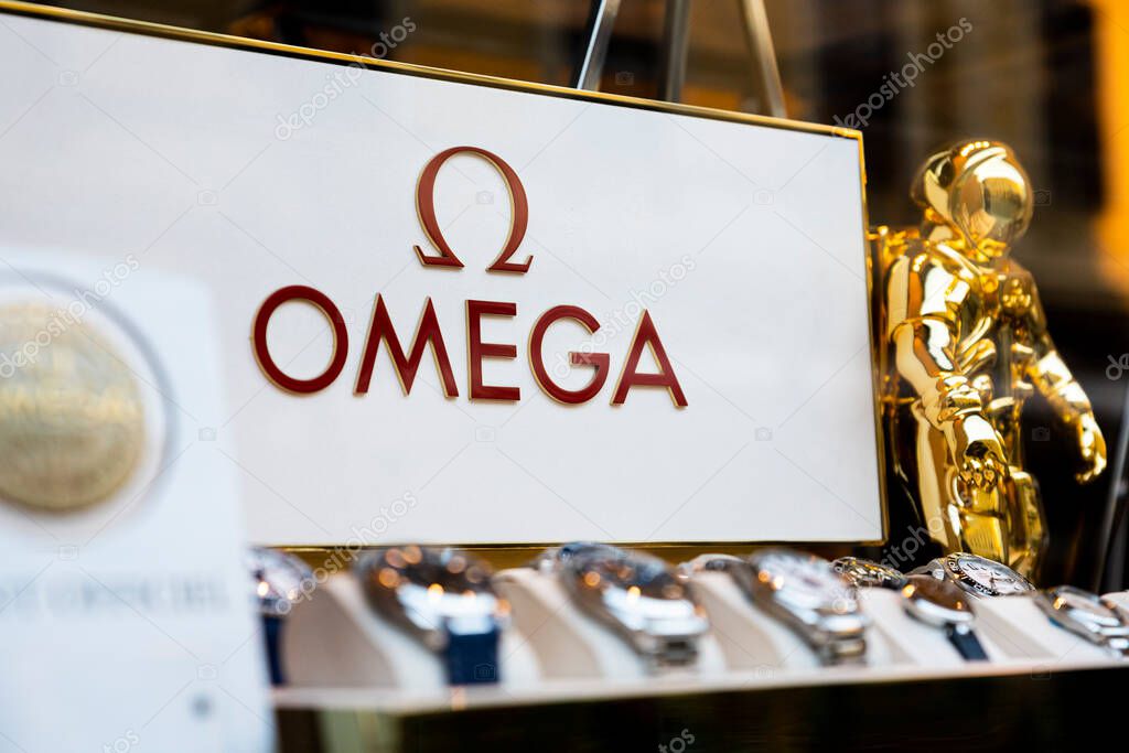 Belgrade, Serbia - November 15, 2021: Omega watch logo in the Omega store in Belgrade, Serbia. Omega watches date from the 19th century. Illustrative editorial