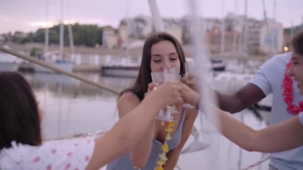 Best Friends Dancing in Yacht and Making a Toast with Champagne Celebrating Christmas at sea. — Stok Video