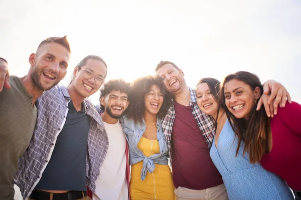 stock image Happy group of friends taking smiling selfie outdoors. Friendship concept on young people enjoying time together and having fun.