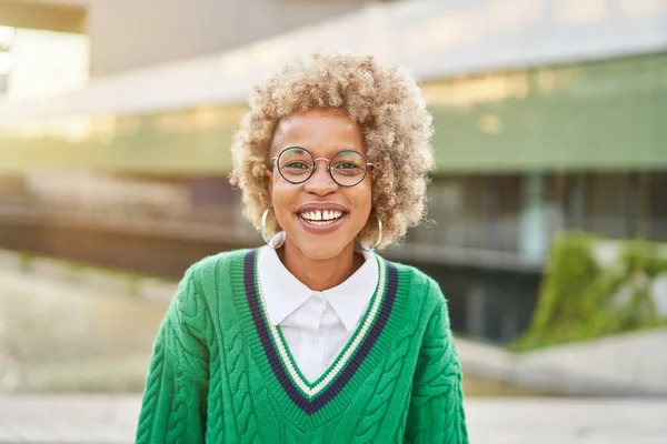 Portrait of a happy Afro American woman outdoors. High quality photo