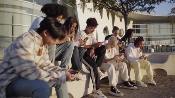 Group Young Technology Addicts Using Mobile Smartphone Outdoor Multi Ethnic — Stockvideo