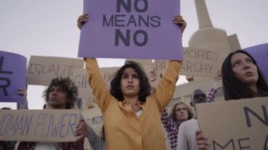 Female Activist Demonstrating Holding Banners, March Against Domestic Violence. Feminist women, Slow motion. High quality FullHD footage