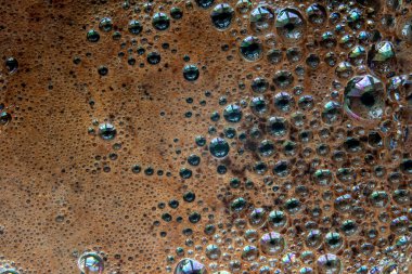Coffee foam, screensaver from bubbles in coffee