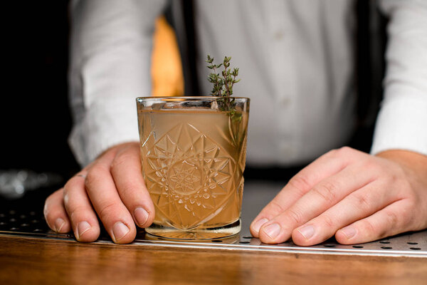 Close View Crystal Glass Cold Cocktail Garnished Branch Rosemary Male Stock Picture