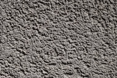 Duvar kağıdı dekoratif tasarımı için arka plan olarak kirli beton bir duvarın güzel yakın plan görüntüsü.