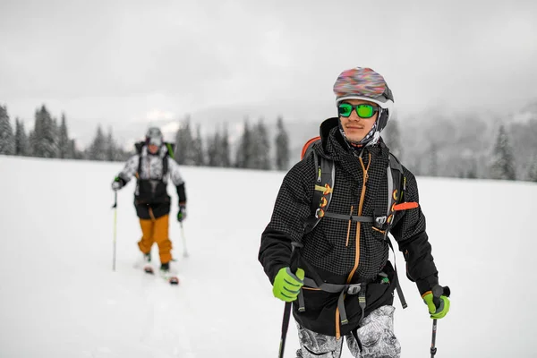 Male Man Skier Sunglasses Black Jacket Trekking Poles Blurred Winter — ストック写真