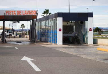 Participations equivalent to a Spanish national lottery ticket worth 20 euros together with a 20 euros bill on a neutral background