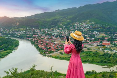 Tourist visiting at Jvari Monastery and Mtskheta city in Georgia.