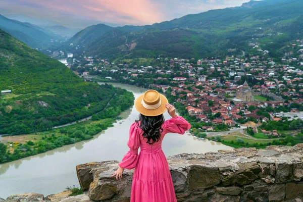 Tourist visiting at Jvari Monastery and Mtskheta city in Georgia.