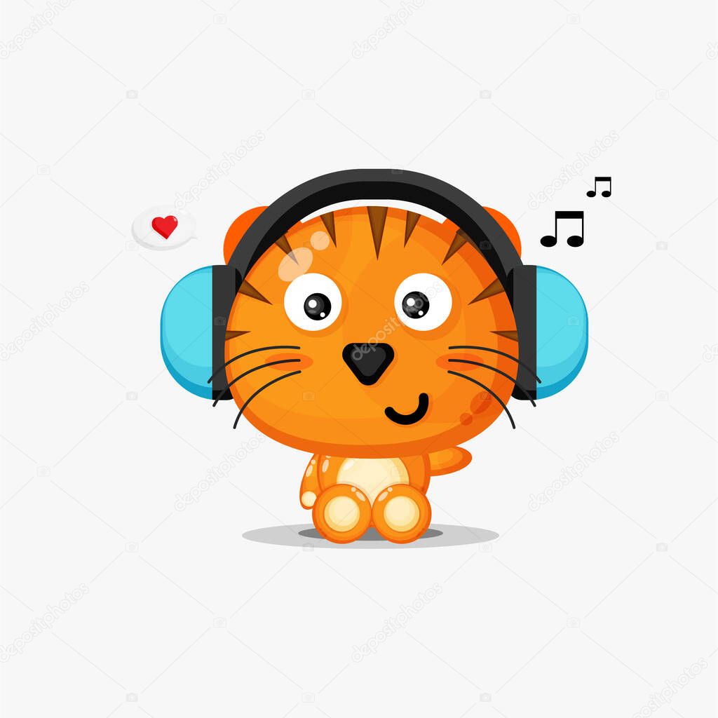 Cute tiger is listening to music