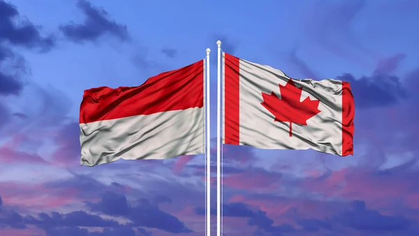 Indonesia Canada Two Flags Flagpoles Blue Cloudy Sky — Stock Photo, Image