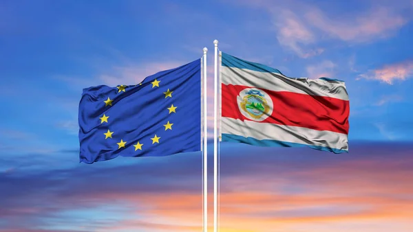 Európai Unió Costa Rica Két Zászlót Zászlórúdra Kék Felhős Égre — Stock Fotó