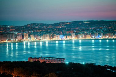 Panoramic view of Tangier at night. Tangier is a Moroccan city located in the north of Morocco in Africa clipart