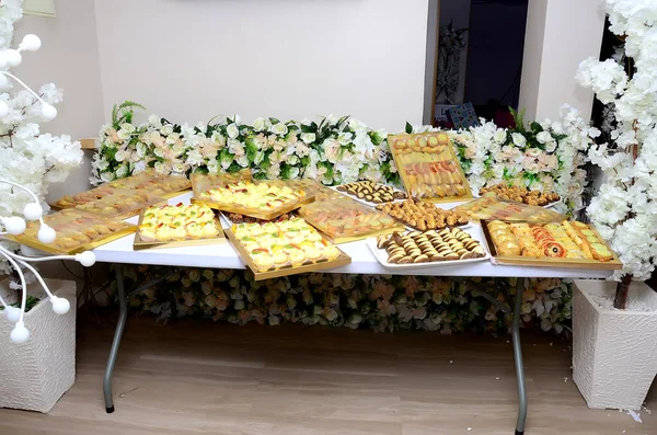 Moroccan biscuit buffet at the entrance of a Moroccan wedding hall