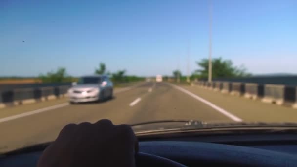The movement of the car on the highway, road or autobahn. first-person view. — Stock Video