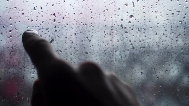 Handwritten inscription in English 911 on frosted fogged glass. — Stock videók