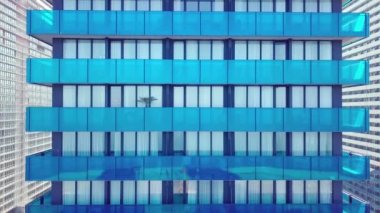 Modern aynalı ofis binasının ön cephesi insansız hava aracından çıkarıldı. yakın plan