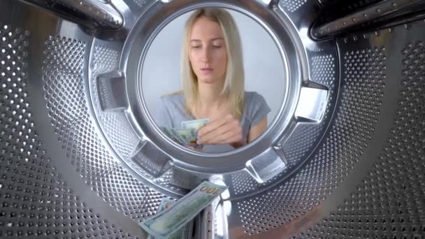 Woman Counts Money Washing Machine She Throws Each Bill Drum — стоковое видео