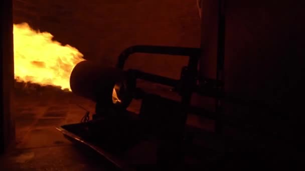 Production oven for making bread. Bakery. Large powerful fire cannon running — Stockvideo