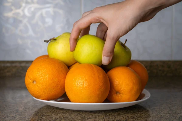 Close Woman Hand Taking Green Apple Plate Fruit Orange Apples — Stock Photo, Image