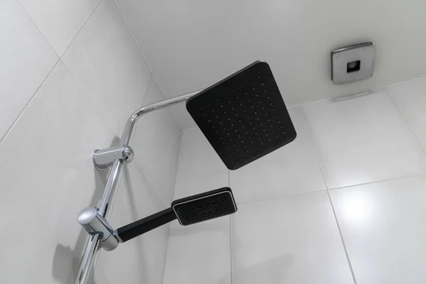 Close Different Sized Black Watering Cans Shower Bathroom — Stock Photo, Image