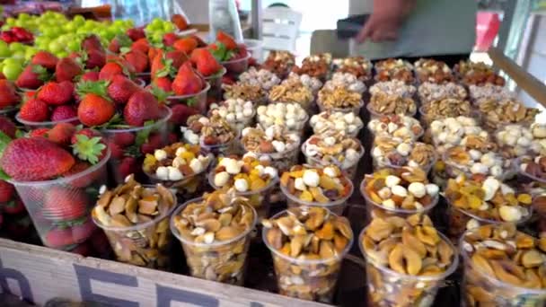 Market Georgia Plastic Cups Dried Fruits Nuts Strawberries Cherry Plum — Stok video