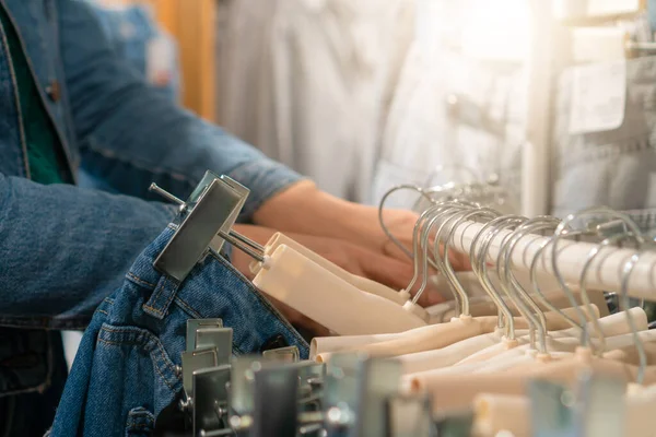 Close Woman Hand Going Hangers Jeans Store Selective Focus Women — Foto de Stock