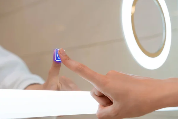 Woman Hand Turns Illumination Bathroom Mirror Touching Touch Button Modern — Foto de Stock