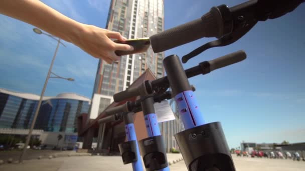 Close Women Hands Hold Phone Modern Urban Electric Scooter Unlock — Vídeo de Stock