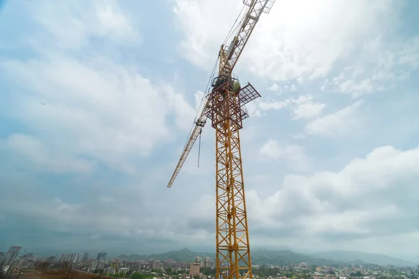 Close Construction Crane Construction Site Protruding Fittings Screed Background Mountains — 图库照片