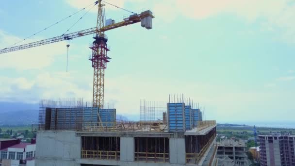 Drone View Multi Storey Building Construction Tower Crane Background Mountains — Wideo stockowe