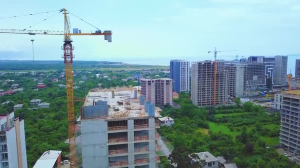Drone View Multi Storey Building Construction Tower Crane Background Mountains — Wideo stockowe