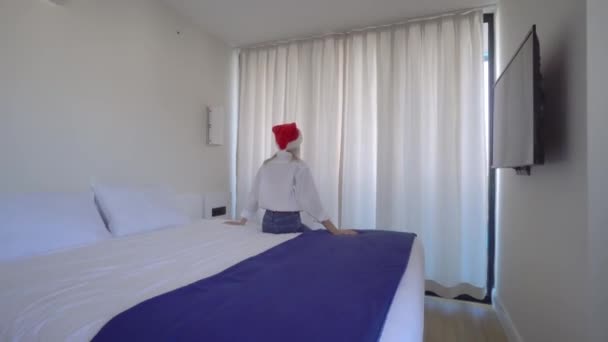 Rear View Woman Santa Claus Hat White Shirt Room Hotel — Stok video