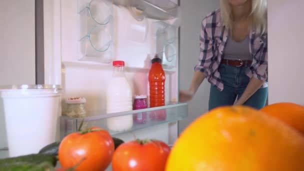 Young Beautiful White Woman Santa Claus Hat Christmas Opens Refrigerator — Vídeos de Stock