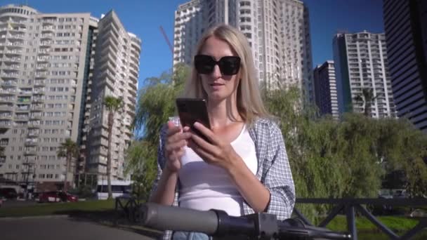 Blonde Woman Black Glasses Uses App Her Smartphone Unlock Shared — Stock video