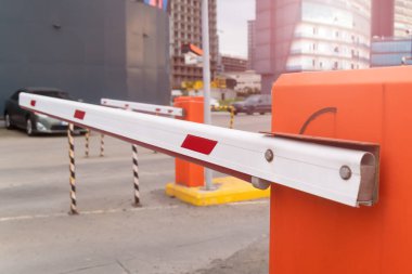 Close-up of the barrier entrance to the territory. The passage of cars to the territory through a barrier with video fixation. Automatic security system. Automatic entry system